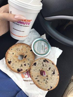 Toasted blueberry bagel w/ veggie cream cheese & medium hot coffee with lotssss of cream & sugar. Yummmm!