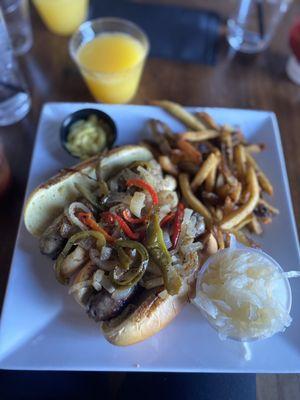 Beer Brauts  with spicy mustard and sauerkraut. Hand-Cut French Fries