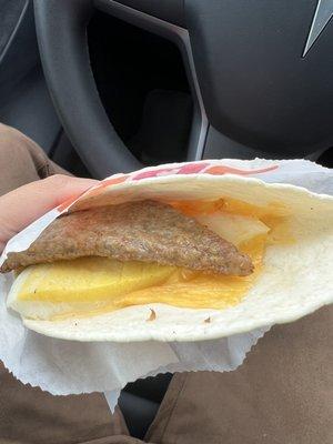 Turkey sausage, egg and cheese wrap - $2 for a flour tortilla with a piece of sausage, egg and a slice of American cheese