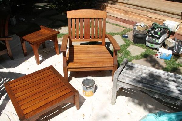 We refinish exterior furniture and decks. From right to left....before and after