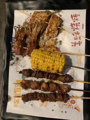 Grilled Lamb, Chicken, chicken heart, corn, bacon enoki, beef throat