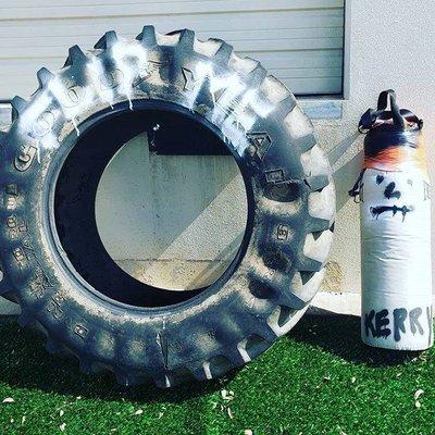 The backyard tire and heavy bag for lugging around