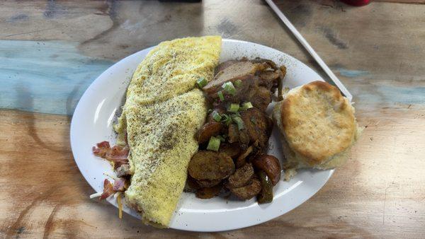 Meat omelette with potatoes and grilled biscuits