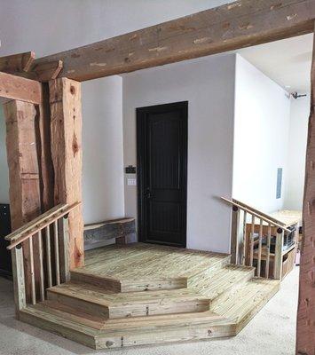 Stair and landing with handrails.