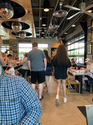 Crowded dining area on a Sunday afternoon