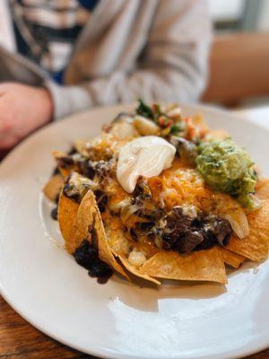 Happy hour nachos w/ Carne Asada & Black Beans