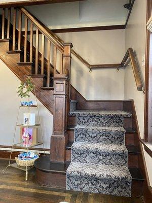 Original staircase - upstairs we currently have a nail & lash technician.