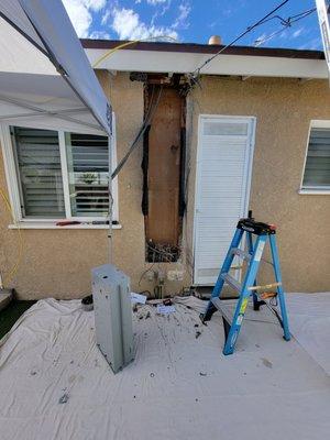 Removing the panel, stucco and readying the space for the new solar ready panel.