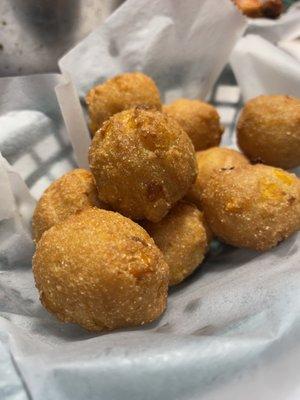 10 Piece Hush Puppies - so delicious! Hot and crunchy on the outside and moist/chewy on the inside.