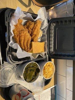 Fried catfish with macaroni and cheese and greens. Delicious