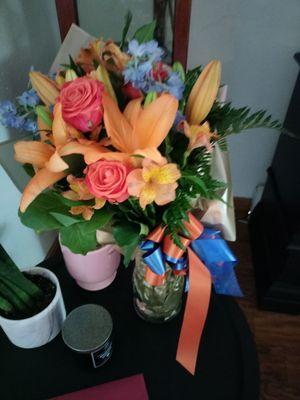 Bouquet in a vase (I got it the day before and put it in the vase overnight) $30. Absolutely PERFECT!