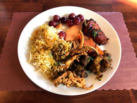 Lunch Buffet Plate (Including Tandoori Chicken, Fruits, Chicken Biryani, and Pakora)