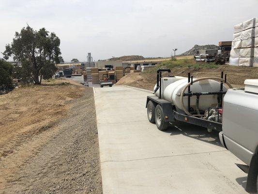 In this picture we made a access ramp for forklifts graded the ramp and added cement.