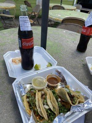 Tacos with cokes