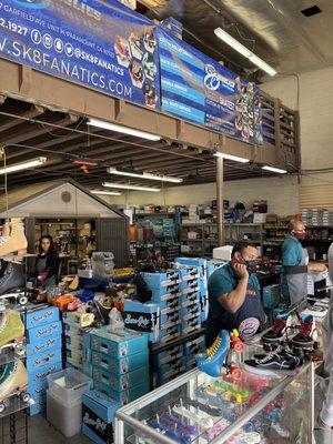 Pete all the way to the right working with my partner on his new skates.