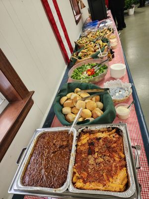 The spread, front left of the photo are beans brought by a family member. Yummy too.... need that recipe