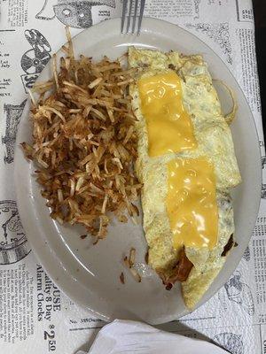 All meat omelet and crispy hash browns