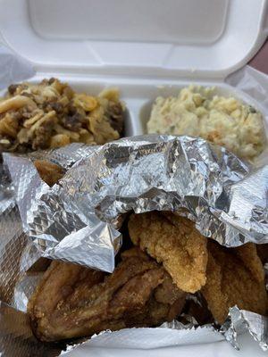 Dinner with fried chicken and fried fish.