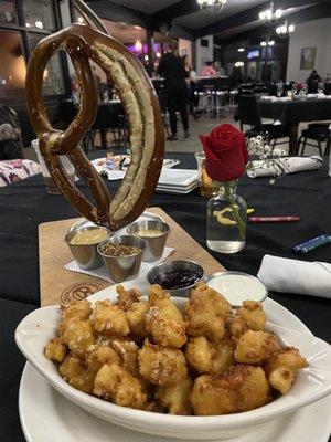 Cheese curds and pretzel appetizer