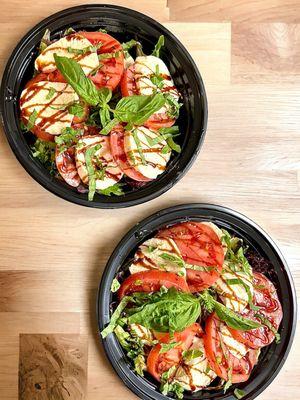 Caprese Salad: Fresh mozzarella, tomato, basil and balsamic glaze over mesclun greens