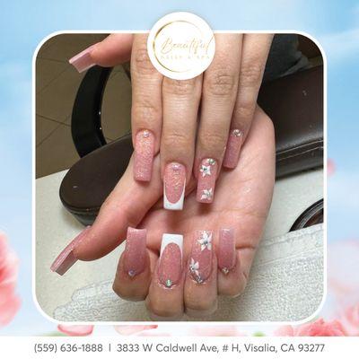 All the sparkle with a touch of floral! 
 : https://lk.macmarketing.us/BeautifulNailsAndSpa-Booking