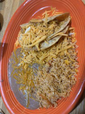 2 chicken taco only cheese with refried beans and rice