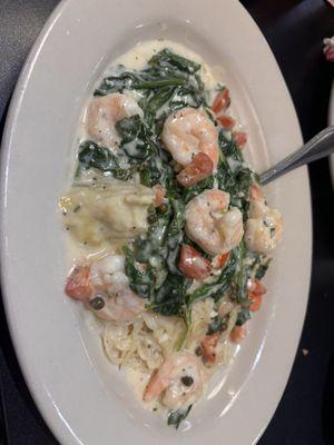 Chicken piccata with shrimp and I added spinach to the dish.