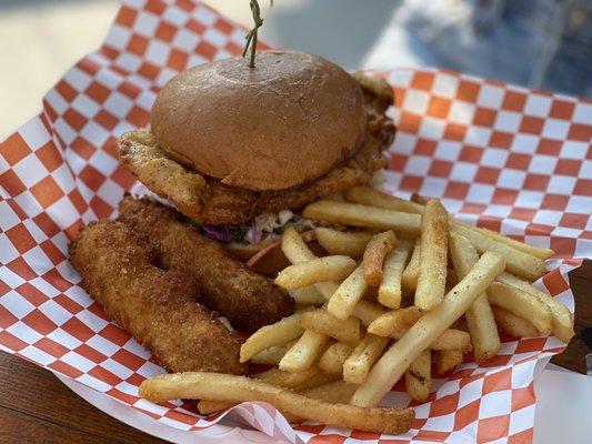 Nearly famous chicken sandwich with classic breading. Fried pickles and fries