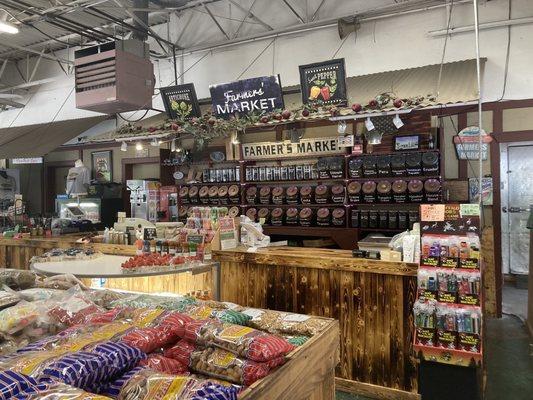 Front counter had strawberries if the day, honey , and other goods.