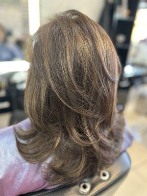 Haircut and style by Dinh at Busy Cuts hair and nail salon. Medium length layers.