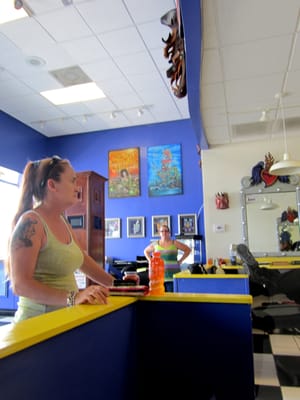 The lovely Mrs. Tina Fowler, a frequent face at the parlor, with the ever-so-friendly Carmen in the background by reception.