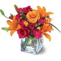 Hot Pinks and Oranges make this Arrangement POP!