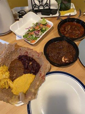 Veggie platter, salad, lamb Tibs, and doro wat