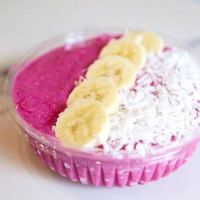 Dragonfruit bowl with pitaya, organic coconut water, gluten free oat, strawberry, banana, chia, lemon, date