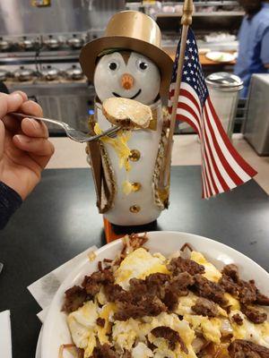 Patriot eats a hashbrowns  bowl