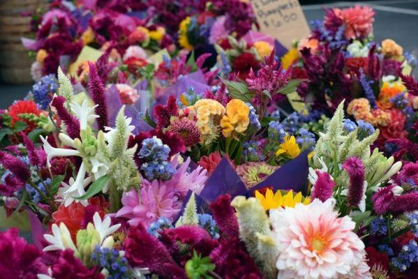 At the Maple Grove Farmers Market, there is a large variety of beautiful - seasonal bouquets available...