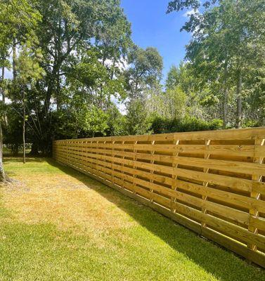 CUSTOM WOOD SHADOW BOX HORIZONTAL PICKET FENCE INSTALLED BY OUR SENTRY FENCE TEAM