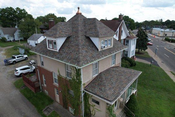 Owens Corning Aged Copper Shingle for this Canton Home.