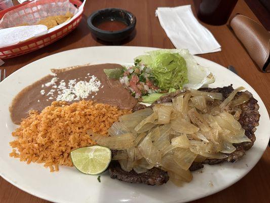 Carne Asada with rice and beans.