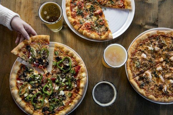 Hand tossed wood fired pizza & local craft beer at Packers