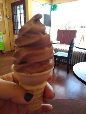 Baby chocolate soft serve, same size as a small from some of our competitors.