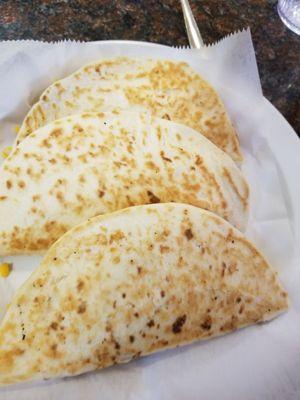 Toasted bean and cheese tacos