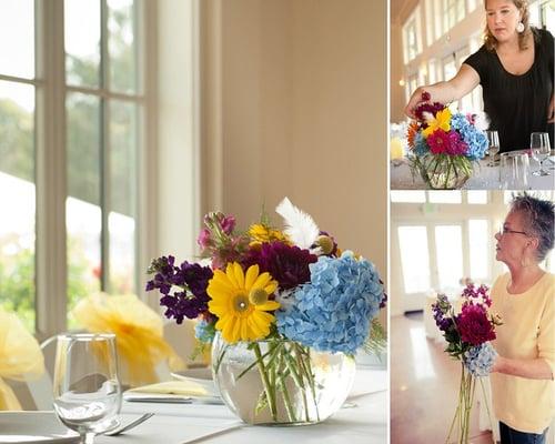 Shannon and Robbin preparing the floral arrangements for a wedding.