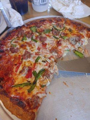 Sausage, pepper and onion Pizza.