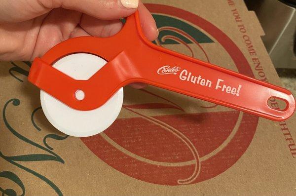 Gluten free pizza cutter provided with each gluten free pizza