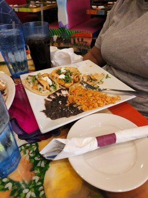 Chicken, soft taco platter with rice and black beans.