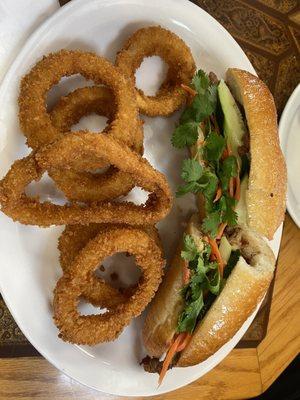 Vietnamese Pork Sandwich with your choice of side. I highly recommend the onion rings!