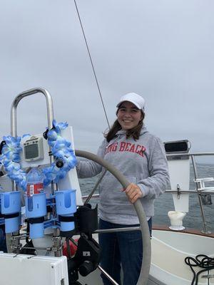 My sister steering the boat!