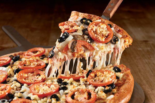 Garden Pizza - Mushrooms, black olives, onions, sliced tomatoes plus feta