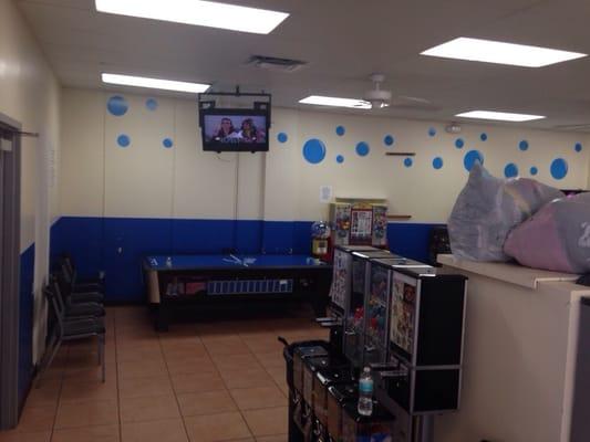 Yes, that's an air hockey table in the laundromat.